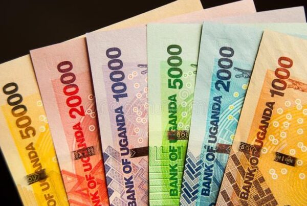 What is the currency in Uganda and how should I manage money?